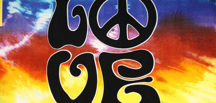 The word "love" in a Woodstock-themed graphic.