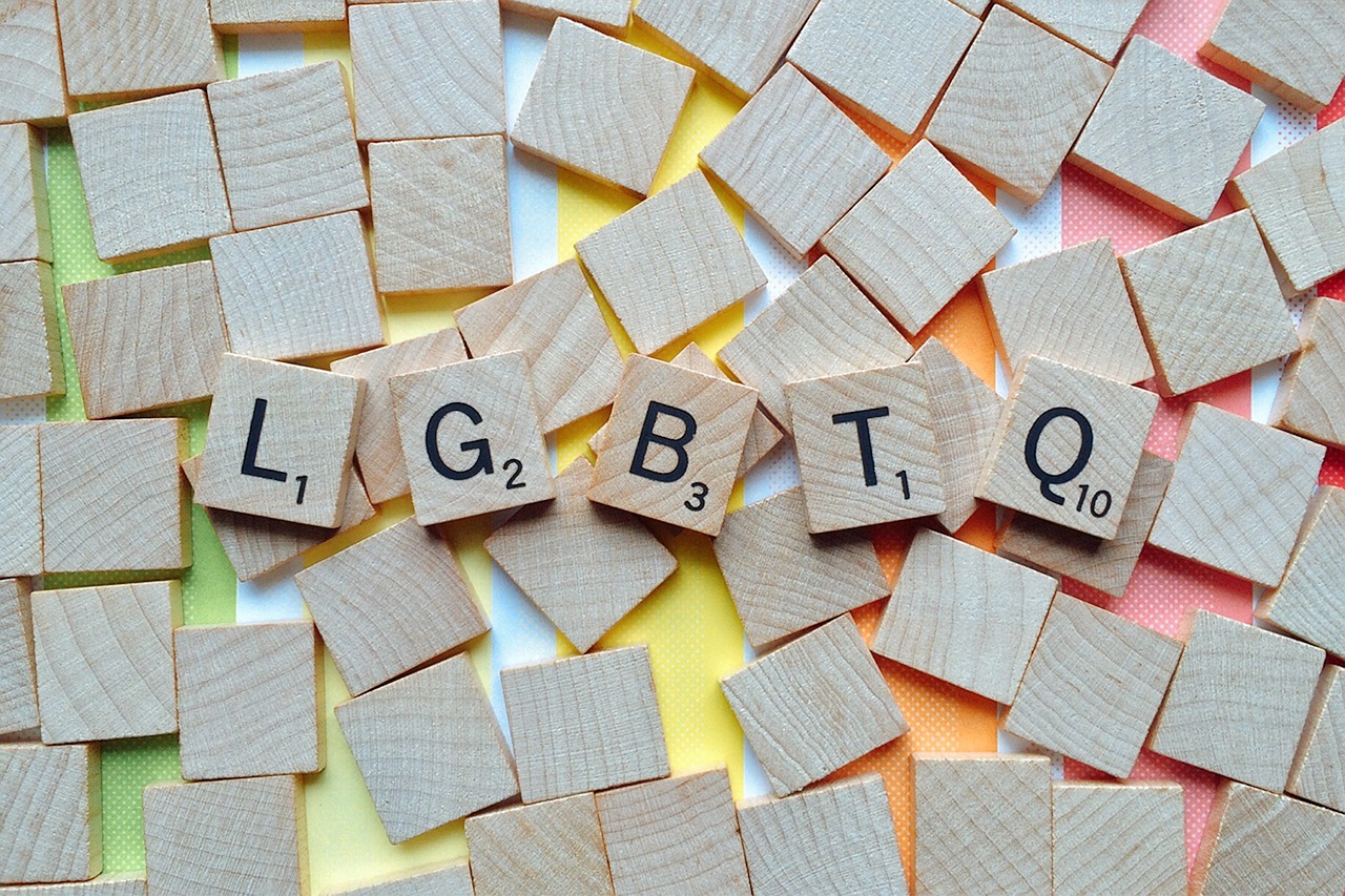 Scrabble letters spelling out LGBTQ.