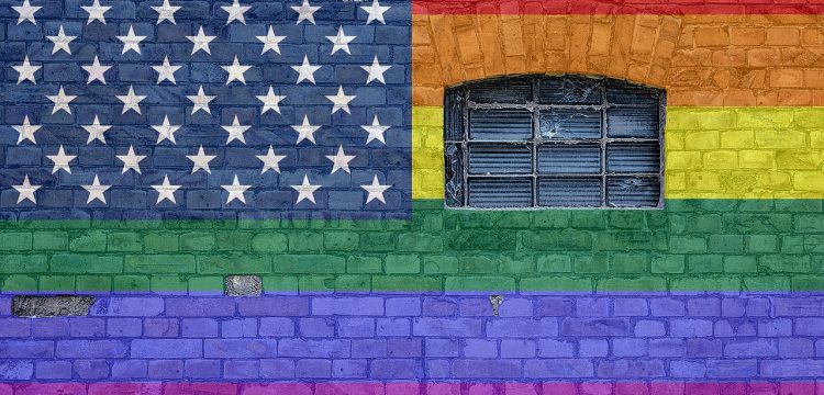 Rainbow painting on wall that resembles the United States flag.