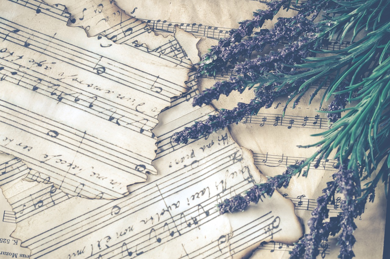Sheet music with pieces of lavender.