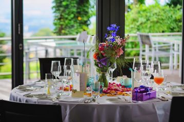 A nicely decorated dining table at a venue.