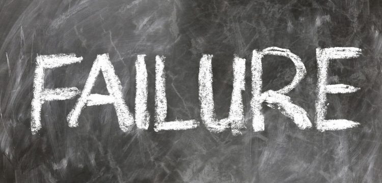 "Failure" written on a chalkboard.