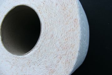 Close up of a roll of toilet paper.