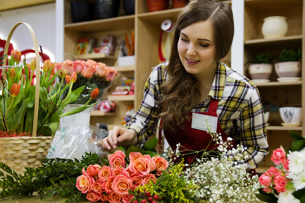 Woman working in a flower shop.