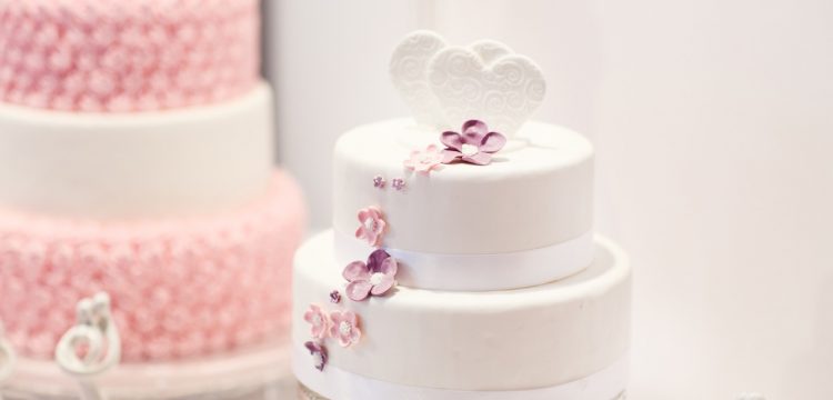 Two wedding cakes.