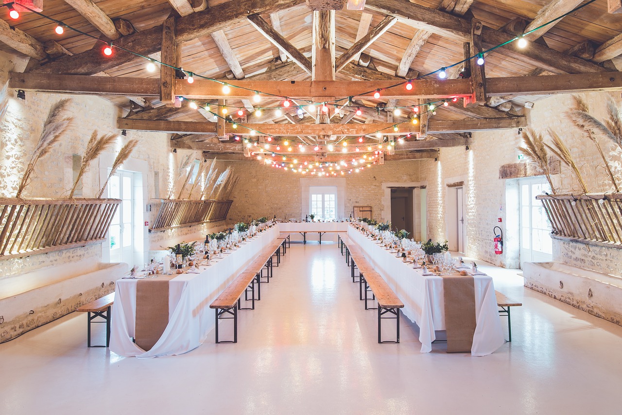 Wedding reception with tables and lights.