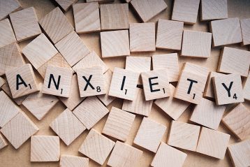 The word, "Anxiety" spelled out in Scrabble letters.