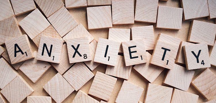 The word, "Anxiety" spelled out in Scrabble letters.