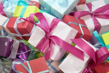 A bunch of colorful wrapped gifts.