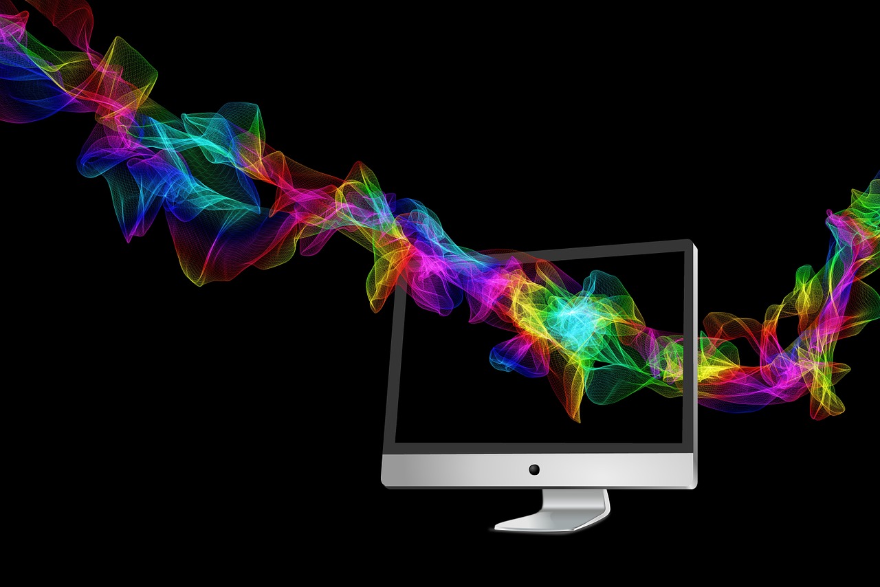 A computer monitor with multiple rainbow colors running through it.