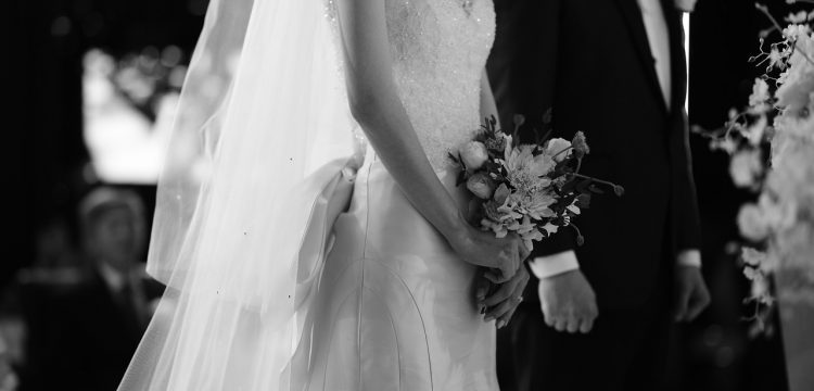 Black and white photo of bride and groom.