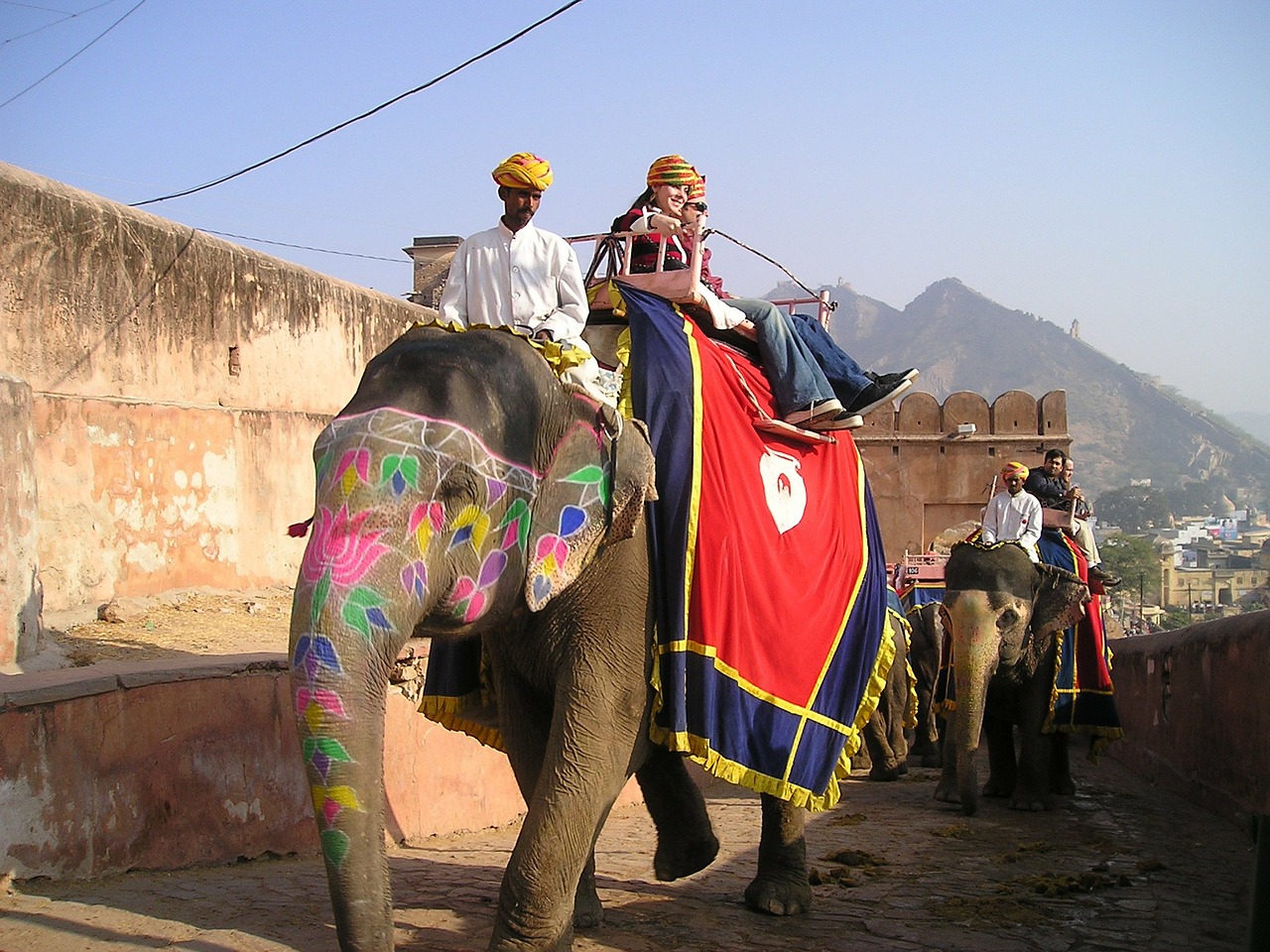 Men riding an Indian elephant.