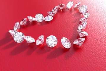 Individual diamonds arranged in the shape of a heart.