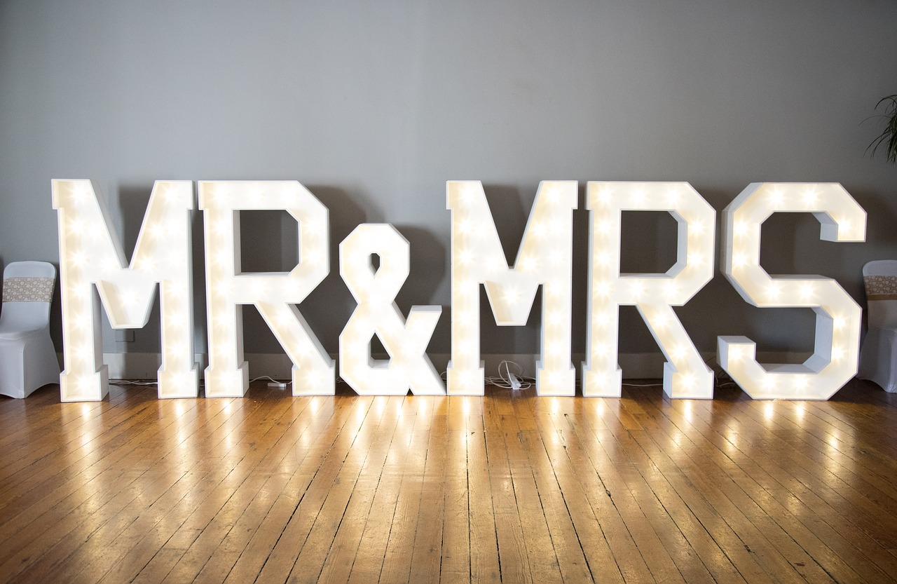 Big lighted letters that spell out Mr. & Mrs.