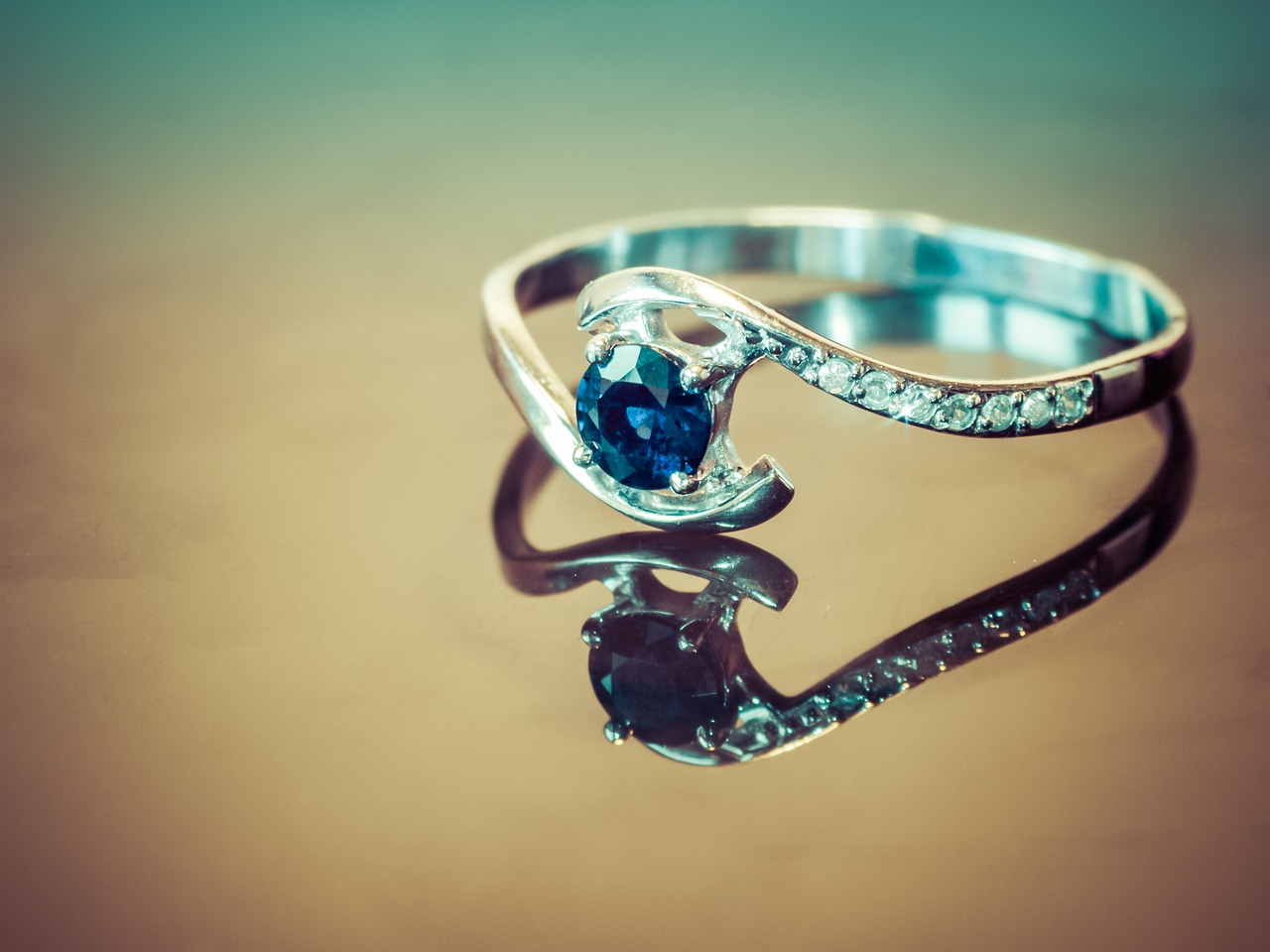 A diamond and sapphire engagement ring.