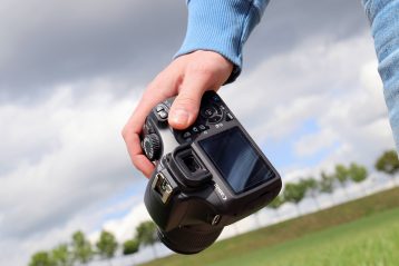 A person holding a camera.