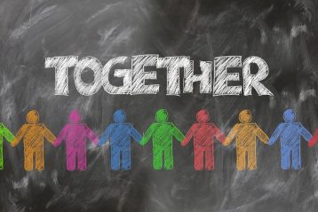 Graphic denoting teamwork or charity.