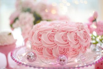A pink wedding cake.