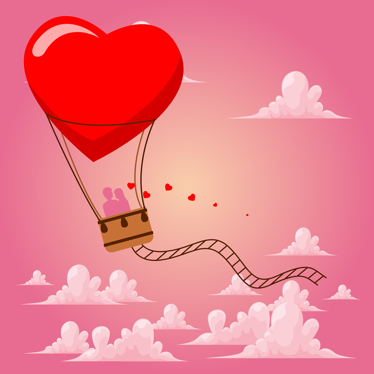 Couple riding in a hot air balloon shaped like a heart.