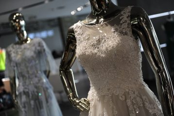 Wedding gowns on mannequins.