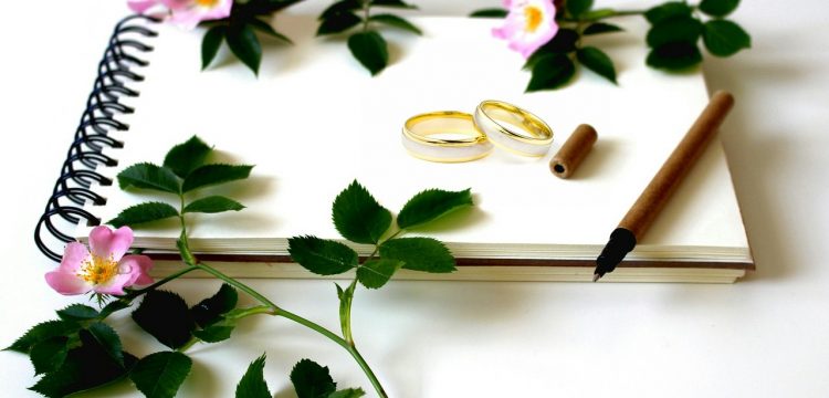 Wedding rings and a date book.