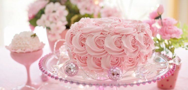 A pink wedding cake.