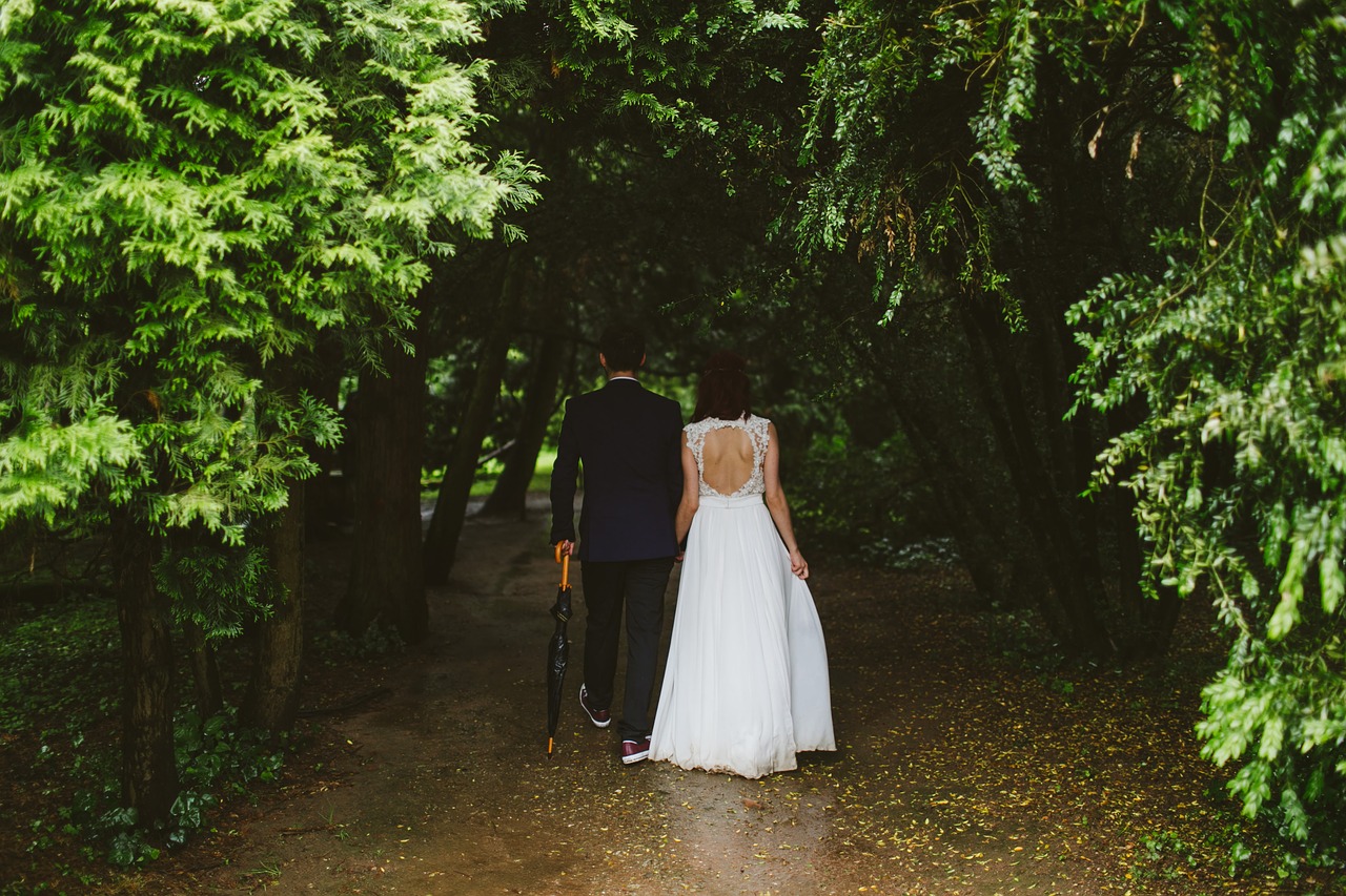 Bride and groom walking.