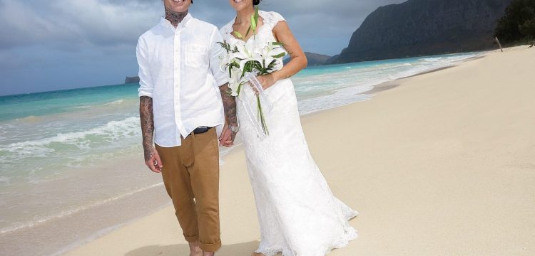 Bride and groom on a Hawaiian beach.