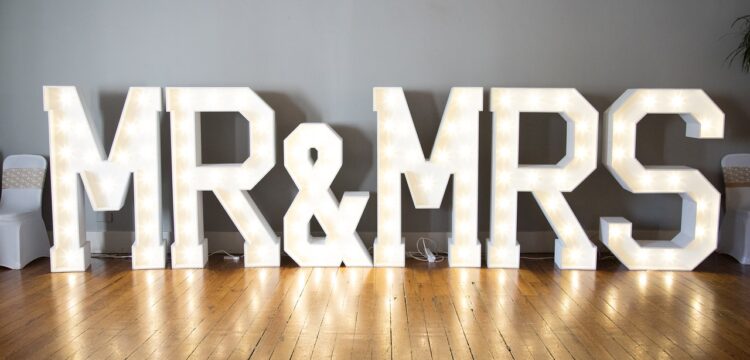 Large lights that spell out "Mr. and Mrs.".