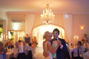 Couple dancing at wedding reception.