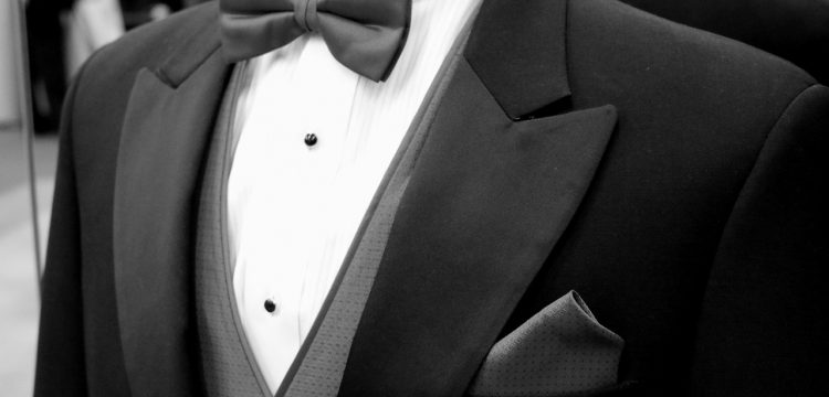 A mannequin wearing a tux.