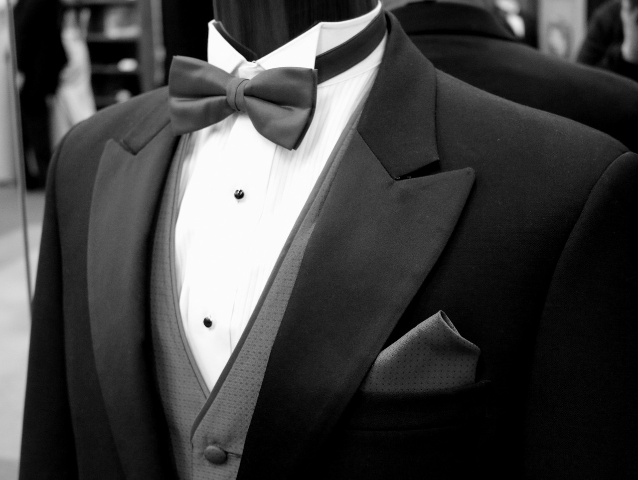 A mannequin wearing a tux.