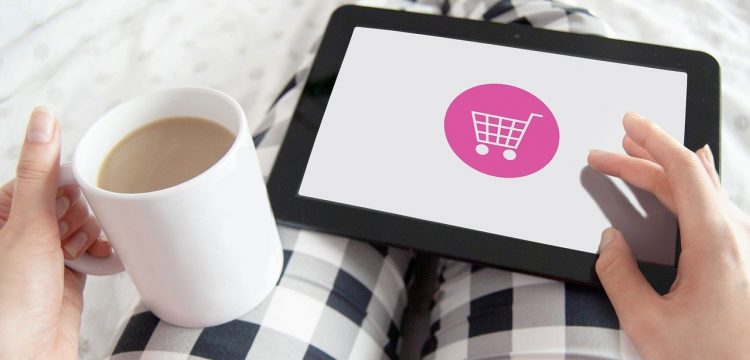 Online shopping graphic on a tablet.