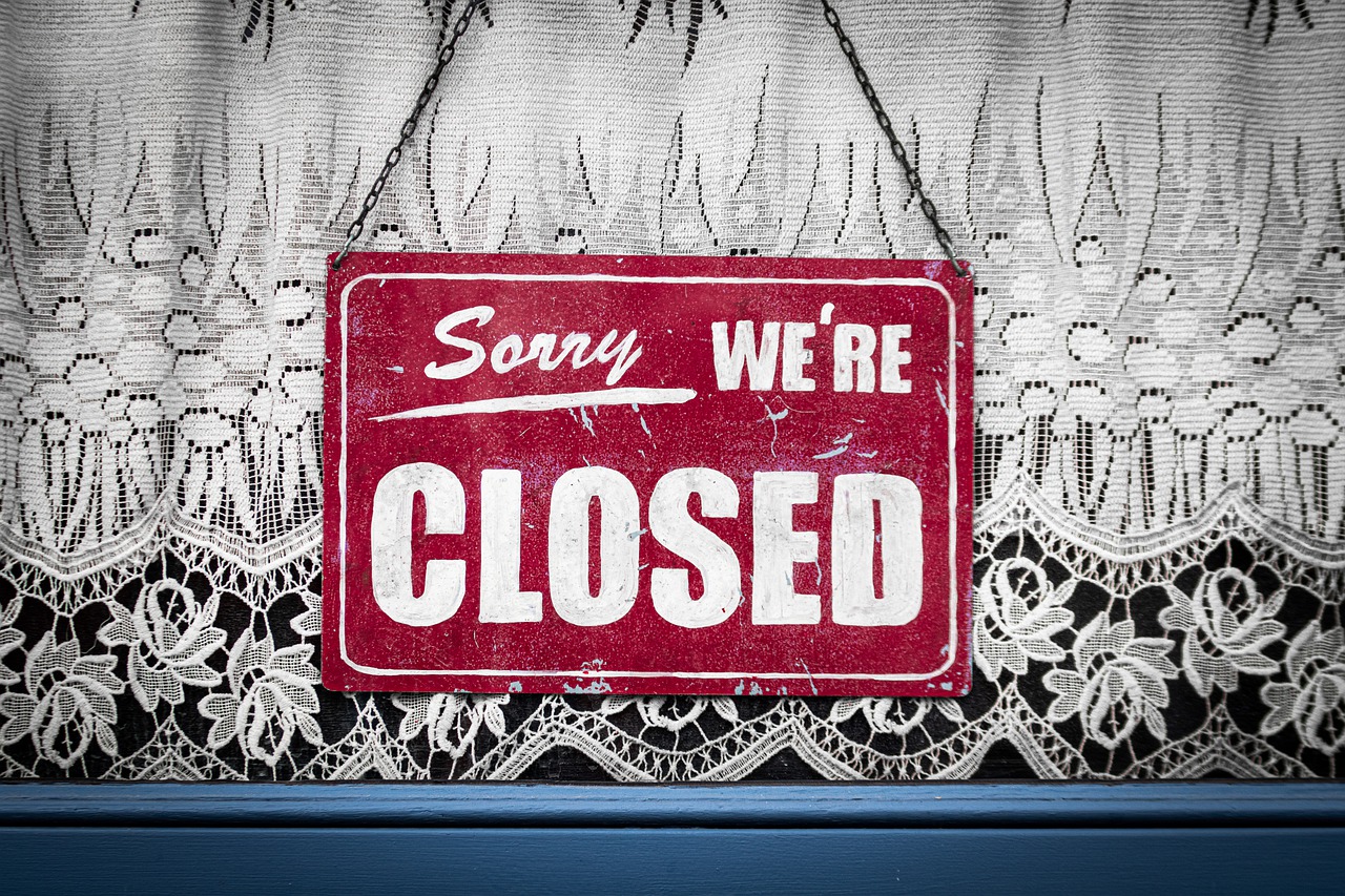 Closed sign on a window.