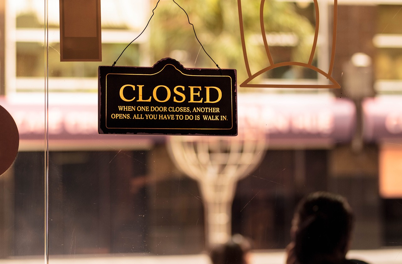 A "closed" sign on a door.