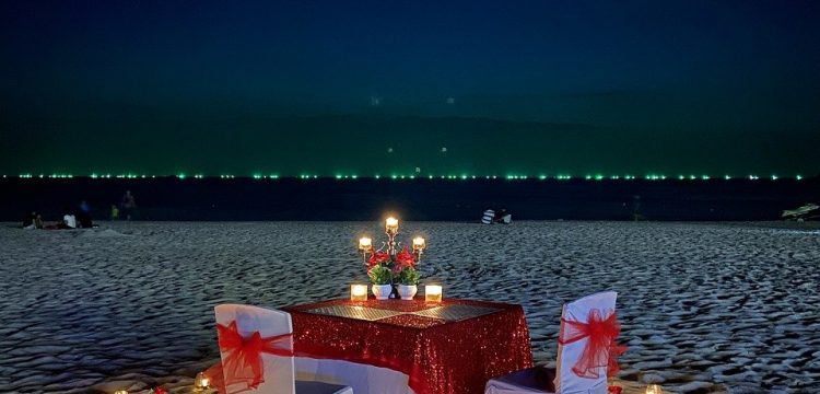 Nighttime beach wedding.