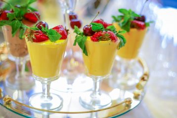 A serving tray full of drinks.
