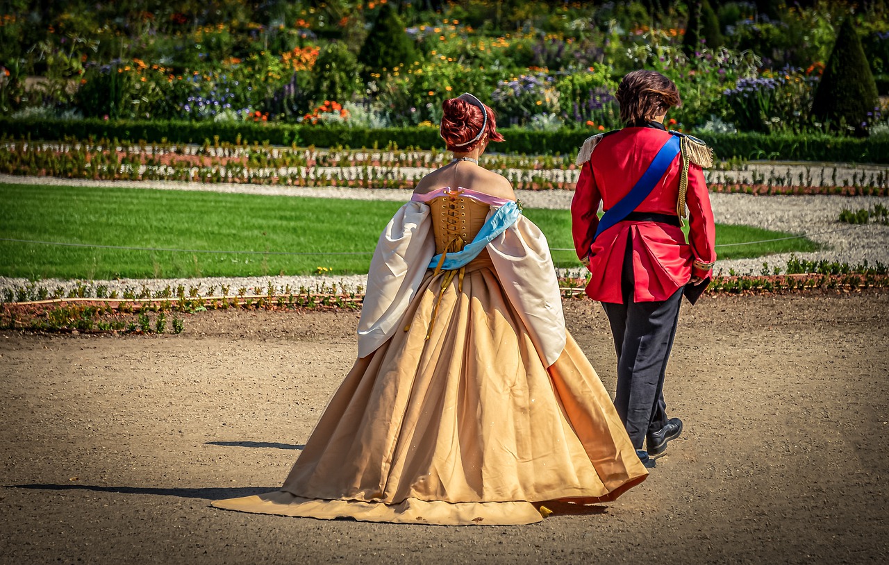 A prince and princess walking.
