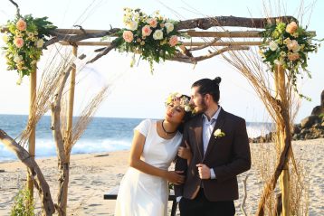 Couple at a beach wedding.