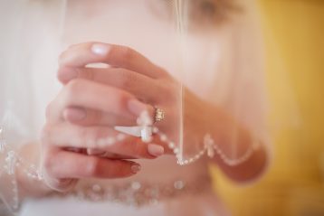 Bride with her diamond engagement ring.