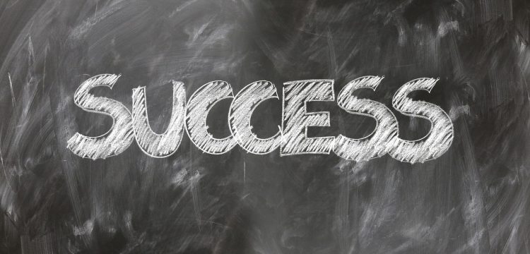"Success" written on a chalk board.