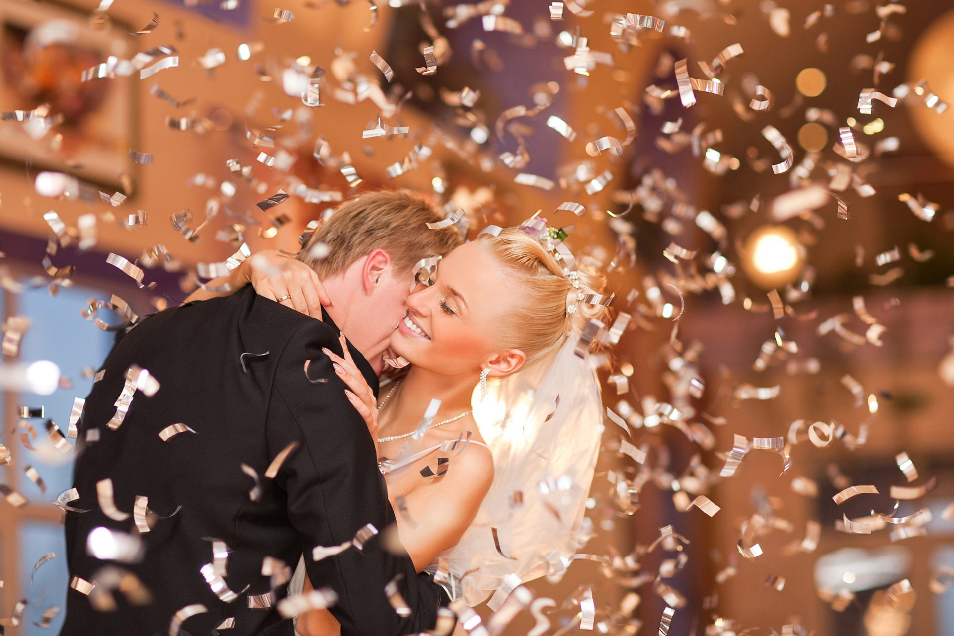 Bride and groom embracing.