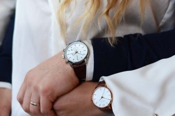 Wedding ouple wearing engagement watches