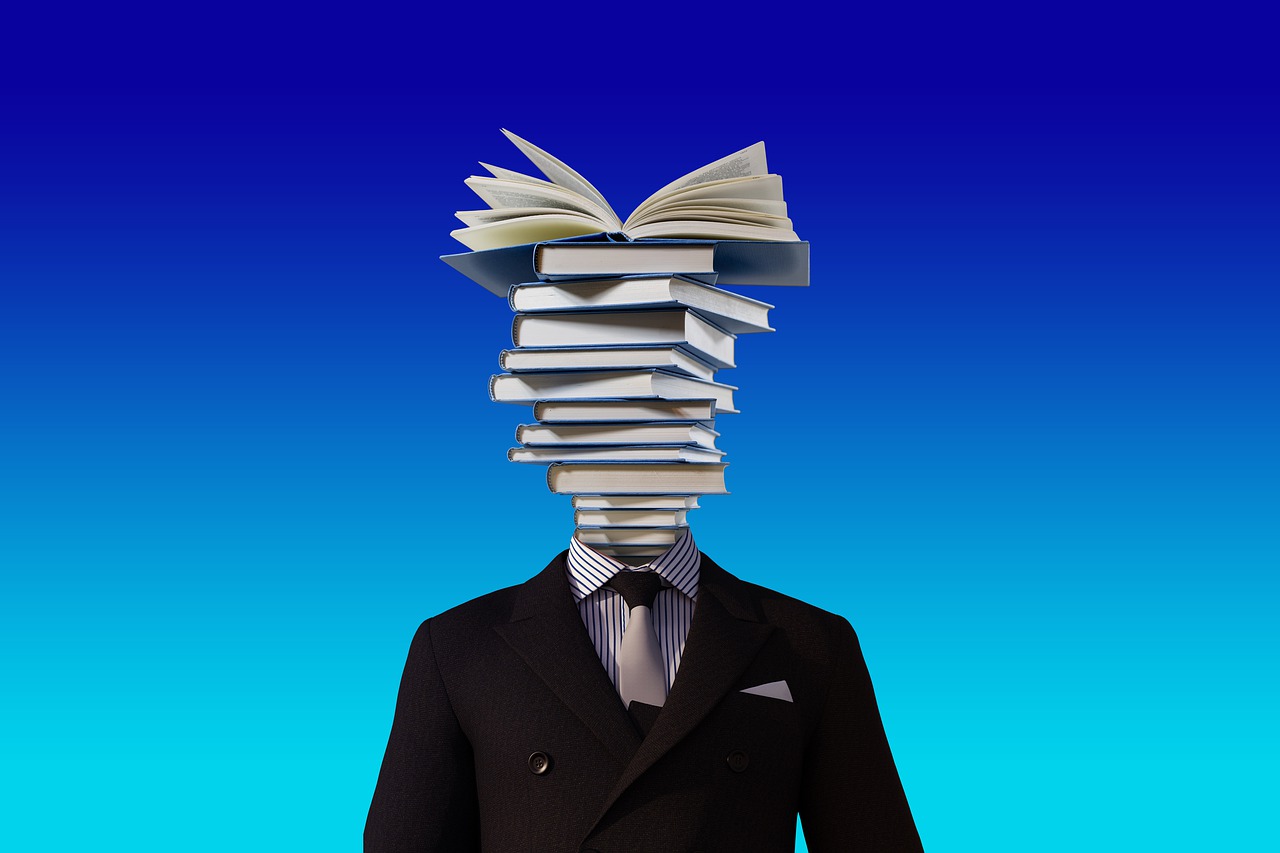 A graphic of a man whose head consists of books.