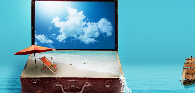 A suitcase with a beach pictured inside of it.