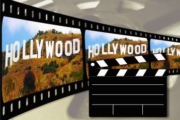 A graphic of a film roll with the word, "Hollywood" on it.