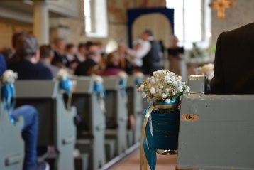 Wedding guests in a church.
