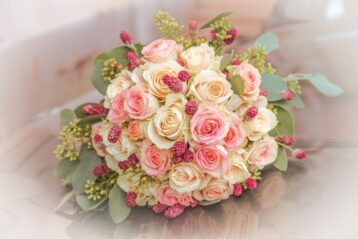 A bouquet of pink and white roses.