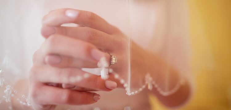 Bride with engagement ring on.