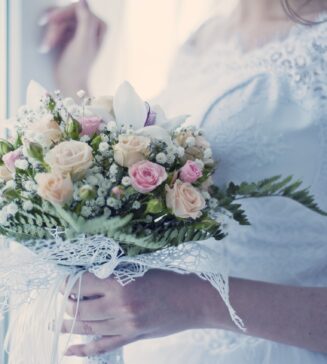 Bride holding a wedding bouquet.